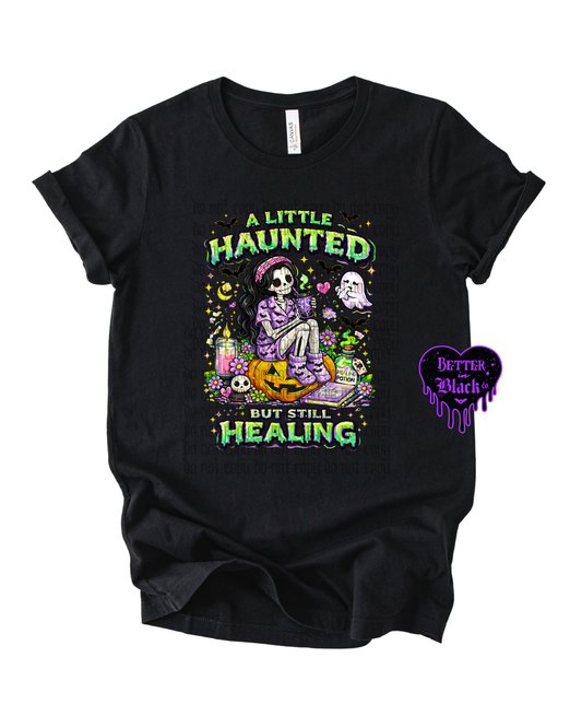 A little haunted, but still healing -  Adult Unisex Tee